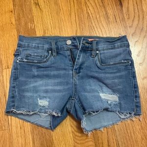 Stylish ripped jean shorts.